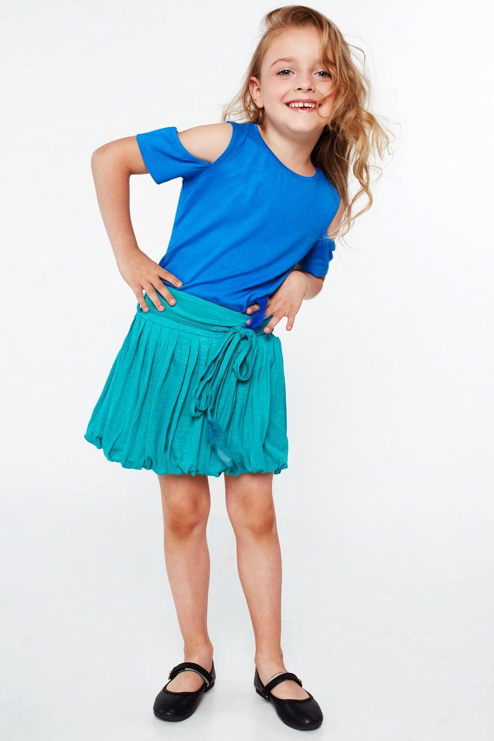 Girls' skirt with feathers, mint NDZ5446 - Sterilamo